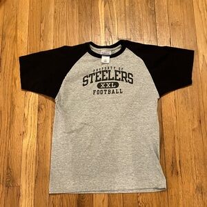 Vintage reebok property of Steelers football boys black and gray tee large 14/16
